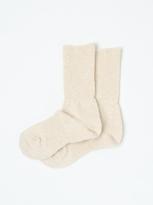 Pair of cream Thick Cotton socks laid side by side with one toe resting over the other.