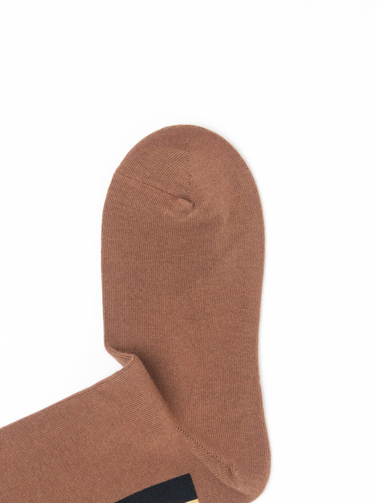A close-up of a single brown sock on a plain white background, showing the ribbed knit texture and a small dark navy label near the cuff.