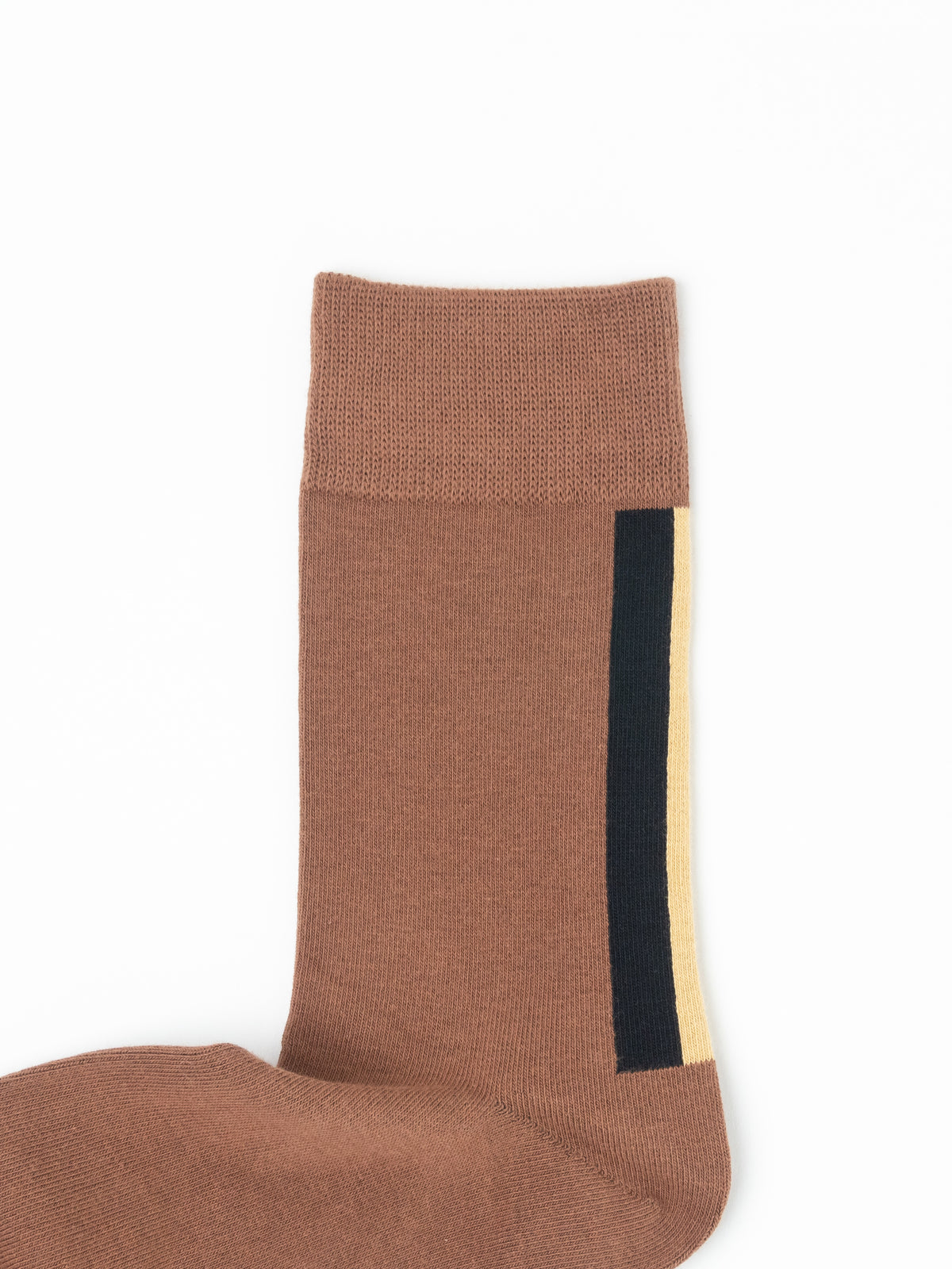 A single brown knit sock with a vertical black stripe bordered by a thin cream stripe, shown against a plain white background.