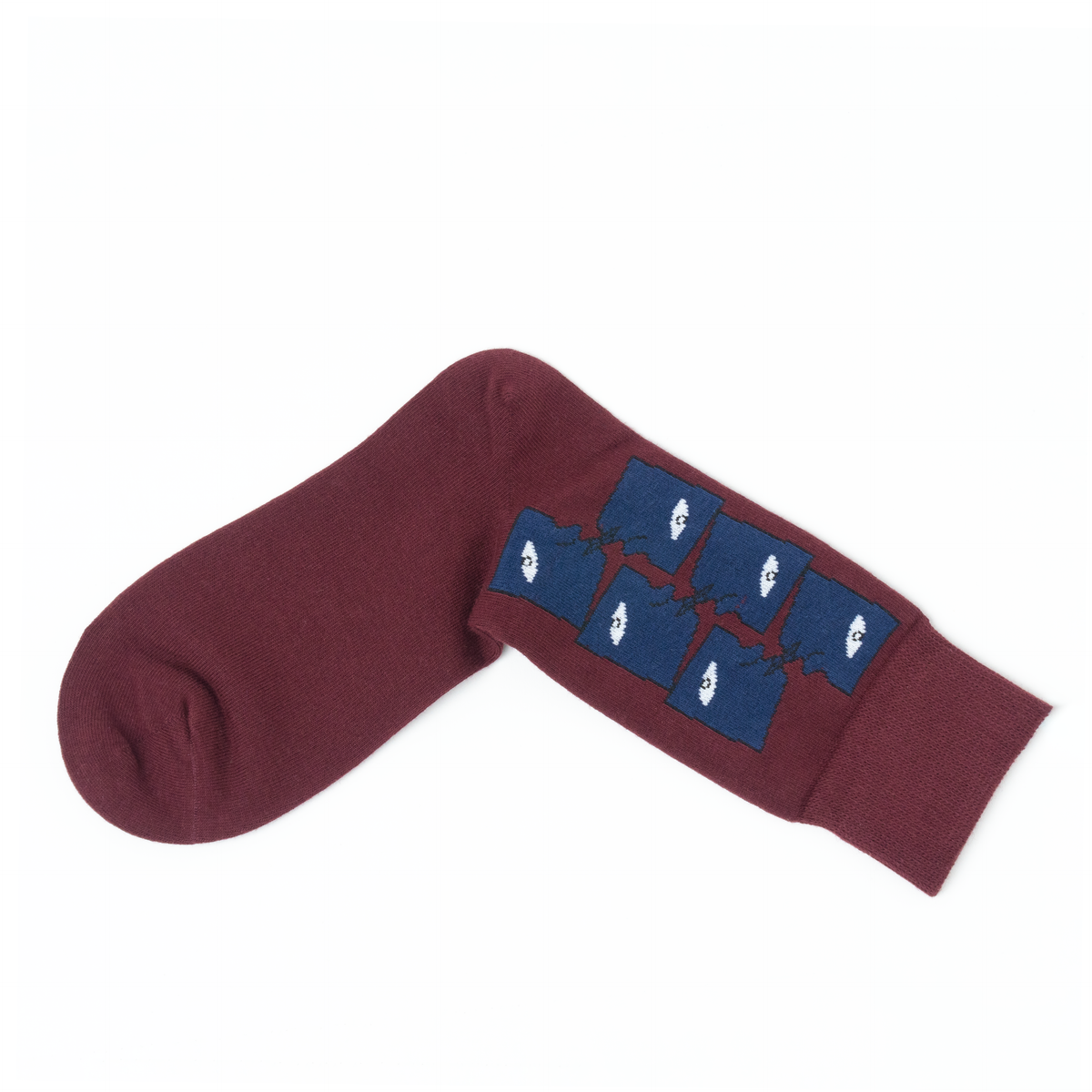 A pair of maroon crew socks with a navy blue cuff featuring six small blue motifs, displayed on a clean white background.