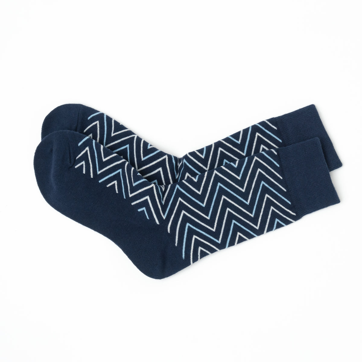 Pair of navy crew socks folded together, showing the white and light blue chevron pattern from heel to toe.