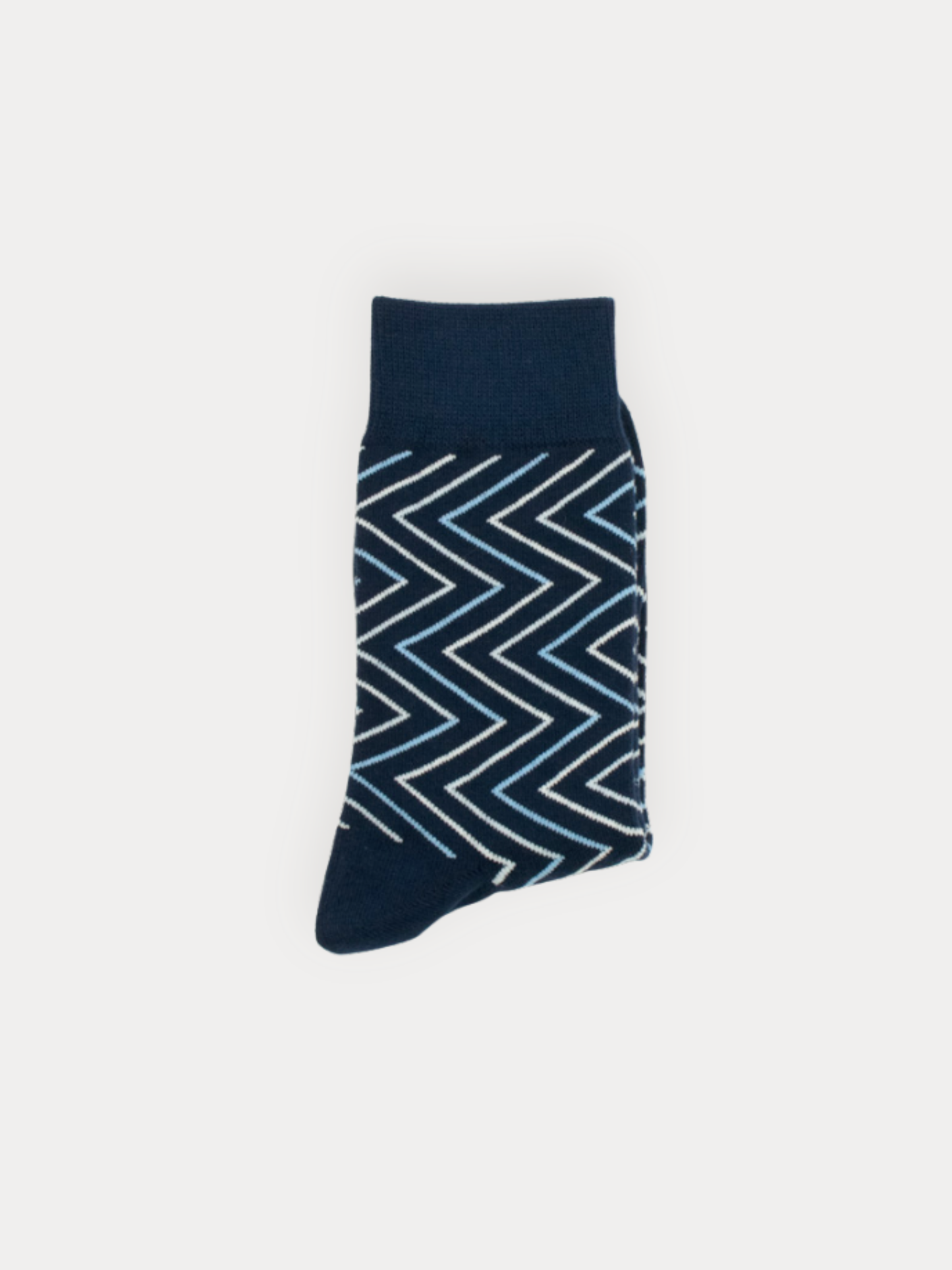 Soft navy crew socks with a layered chevron pattern in white and sky blue. 