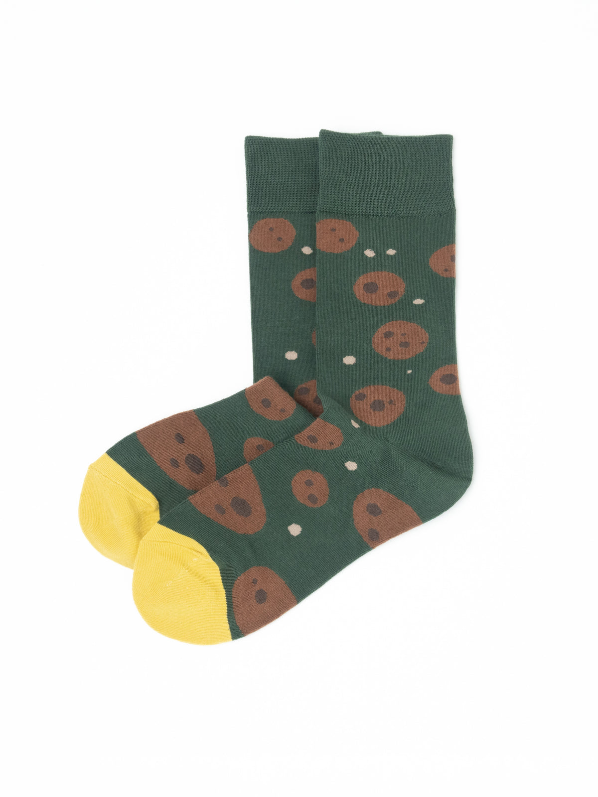 Pair of green crew socks with a cookie print and yellow toes, laid flat and overlapping at the ankle.