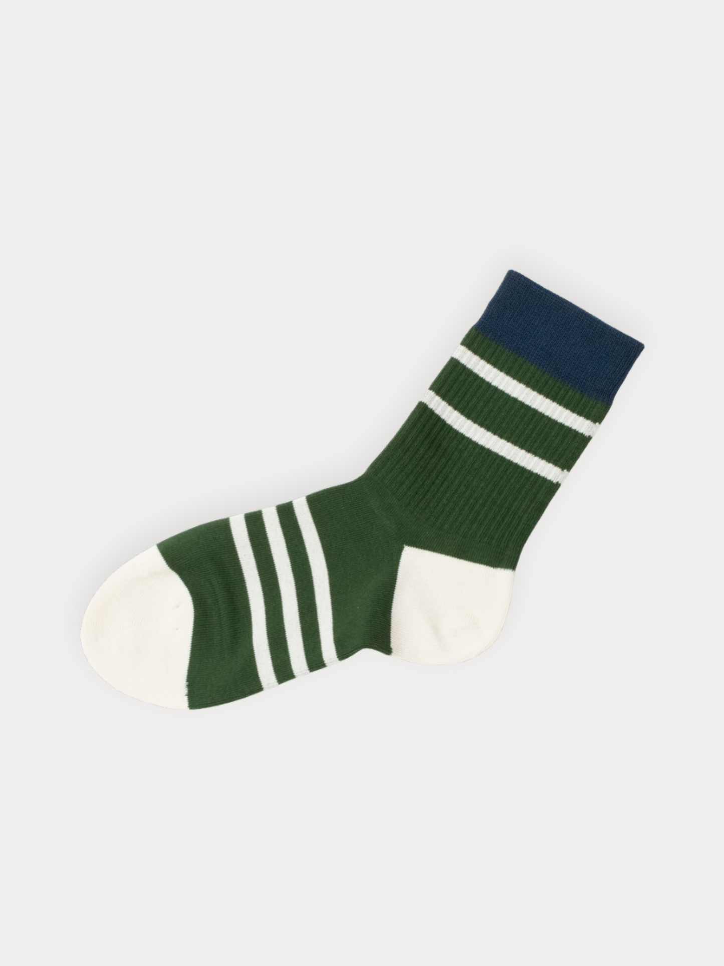Green and navy striped sock on a white background