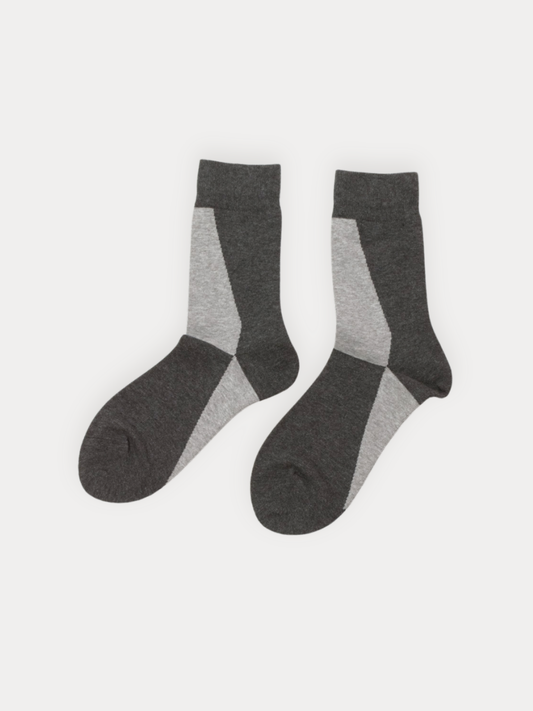 Pair of gray socks on a white background