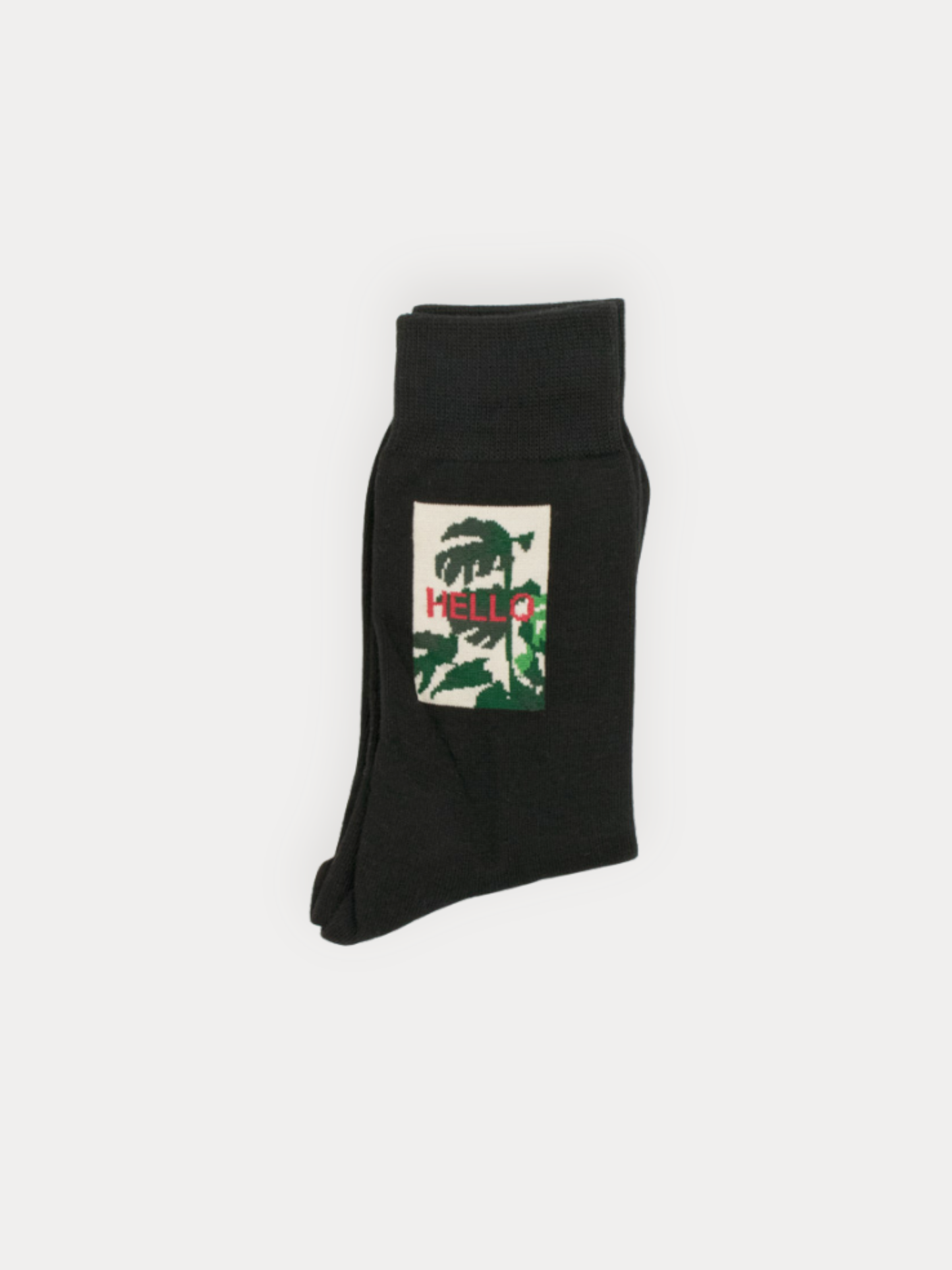 Soft black crew socks with a framed botanical "Hello" graphic. 