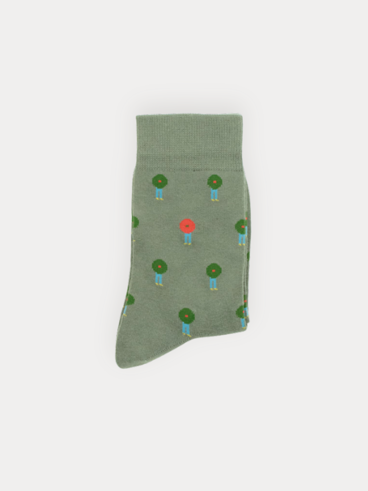 Green sock with tree pattern on a white background