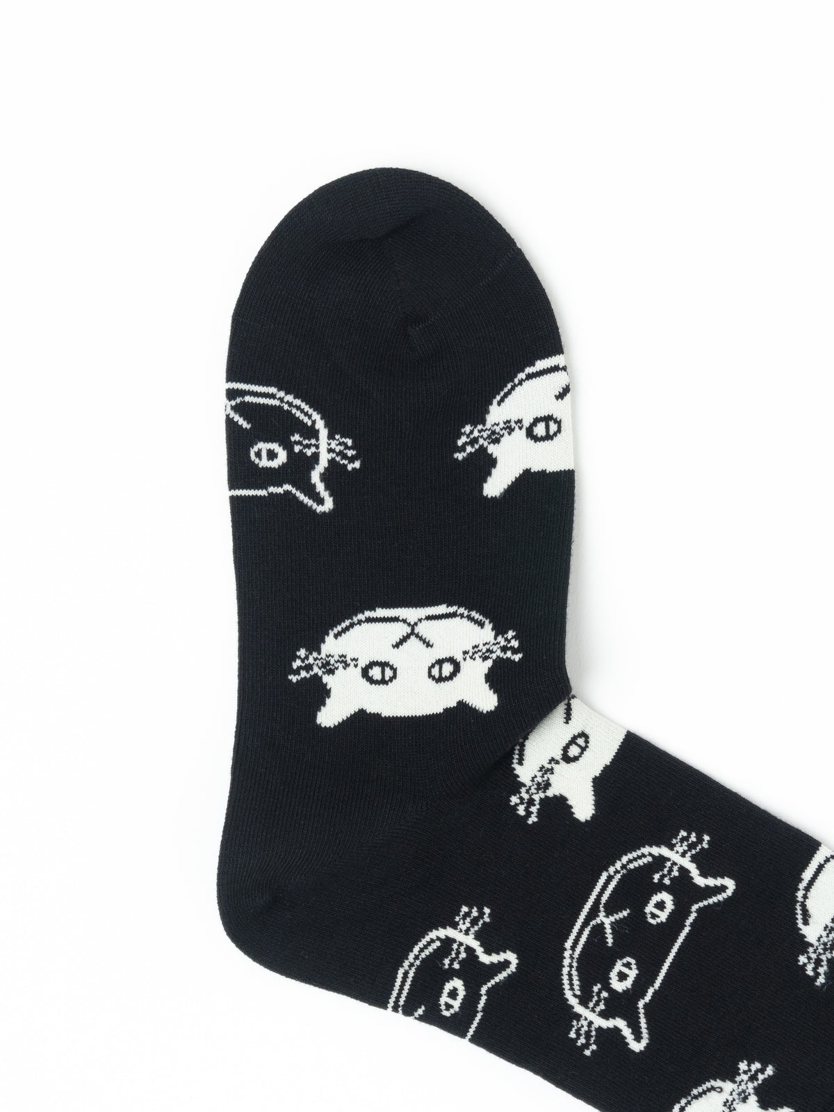 A single black crew sock with a repeating white cartoon cat face pattern, shown against a plain white background.