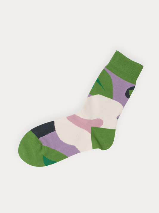 Colorful sock with abstract pattern on a white background