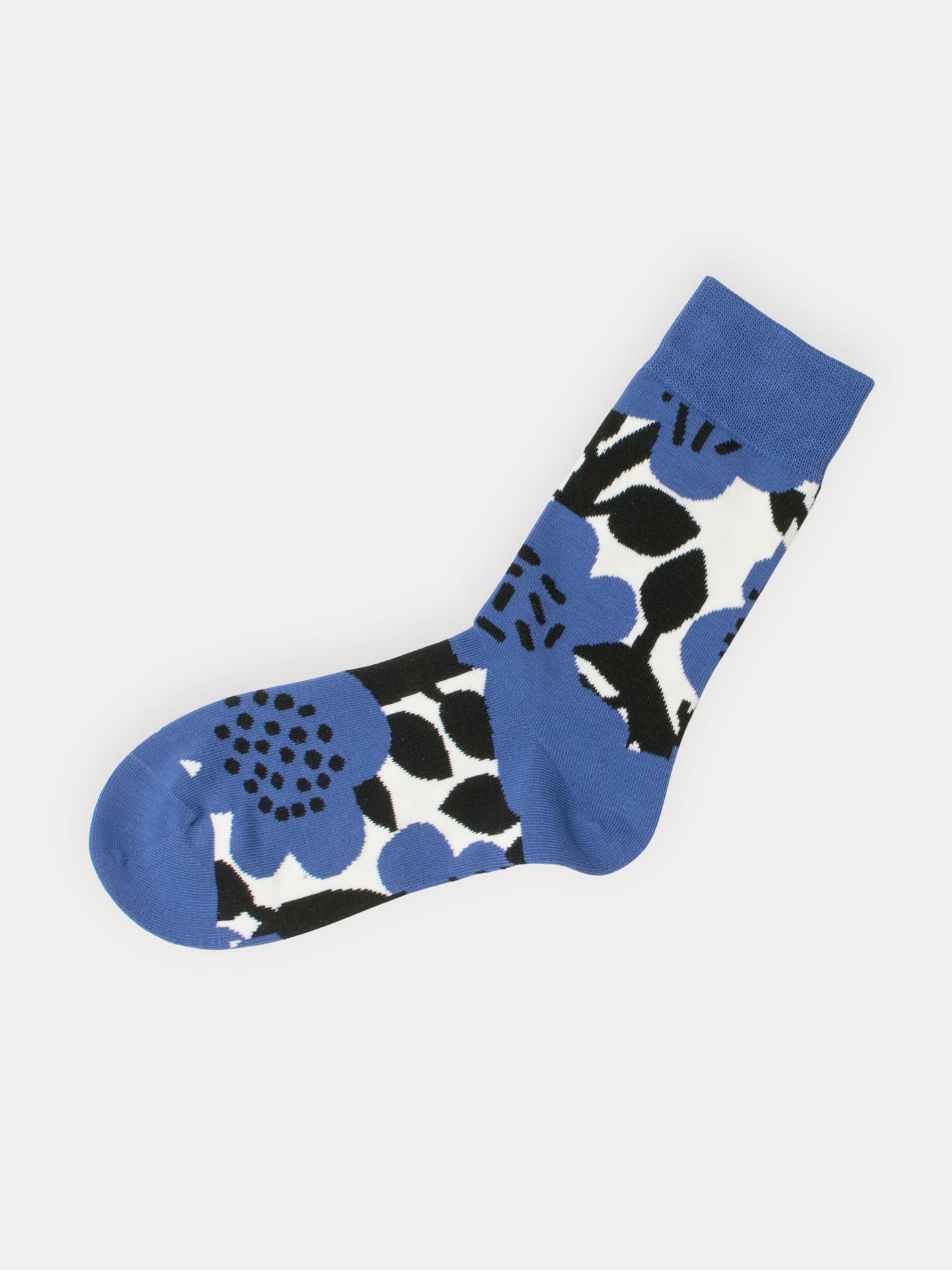Blue sock with black floral pattern on a white background
