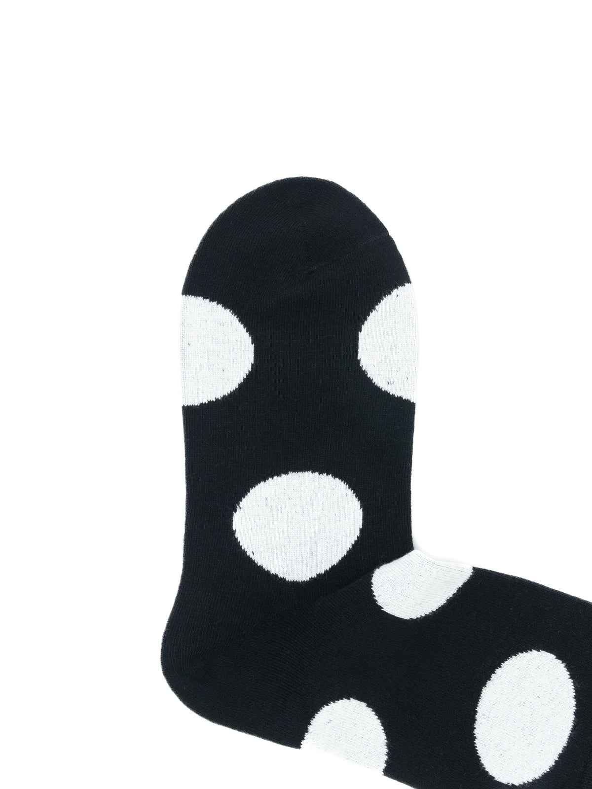 Black socks with large white polka dots, shown on a plain white background.