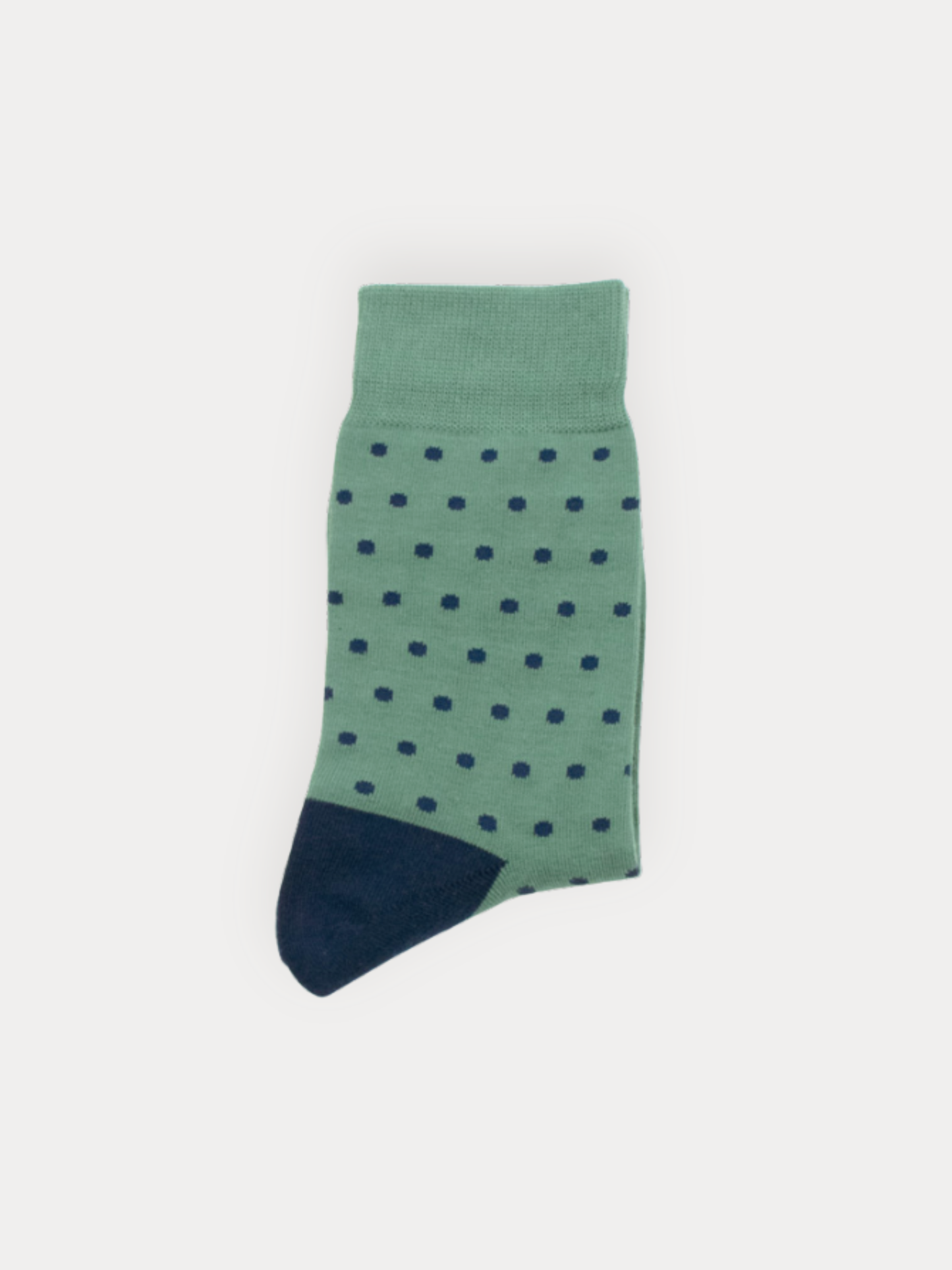 Sage Navy color soft crew socks with an all-over mini dot print and contrast heel and toe.