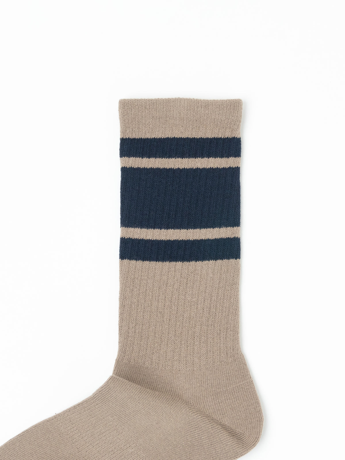 A single ribbed knit sock in brown with two navy blue horizontal stripes near the cuff, shown on a plain white background.