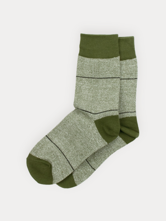 Pair of green socks on a white background