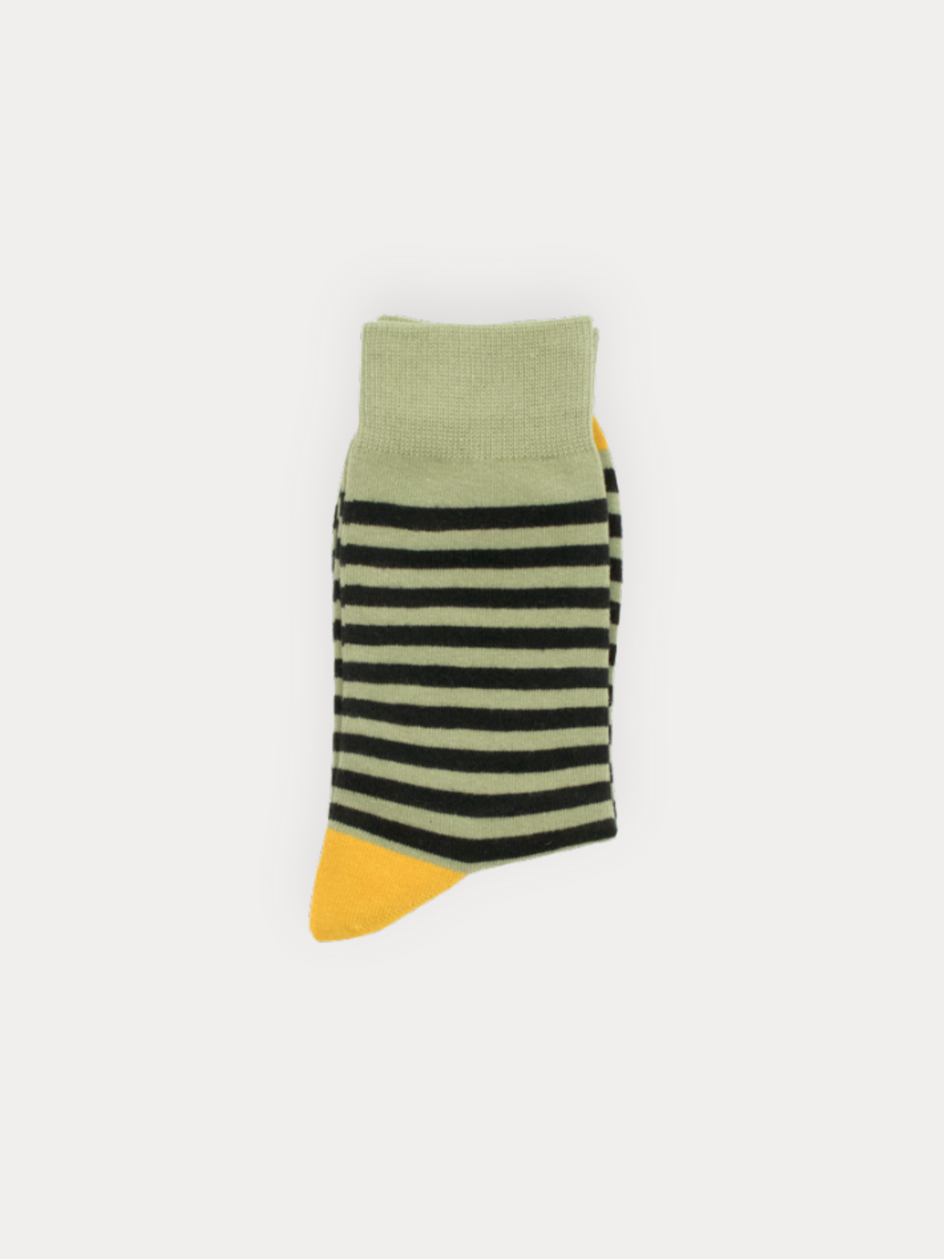 Striped sock with green, black, and yellow colors on a white background