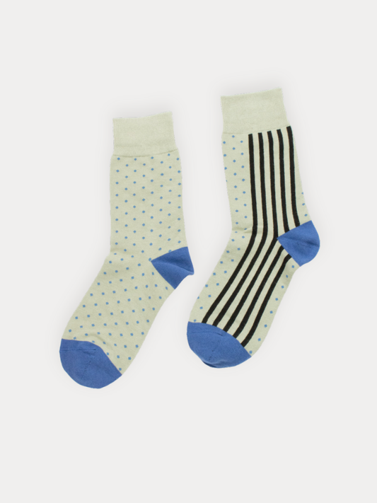 Soft crew socks in pastel gray with vertical black stripes, blue dot accents, and periwinkle heel and toe. 