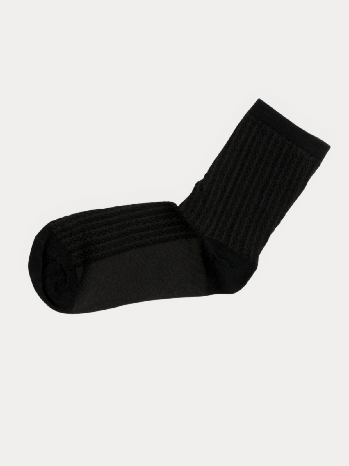 A single black ribbed crew sock shown against a plain light gray background.