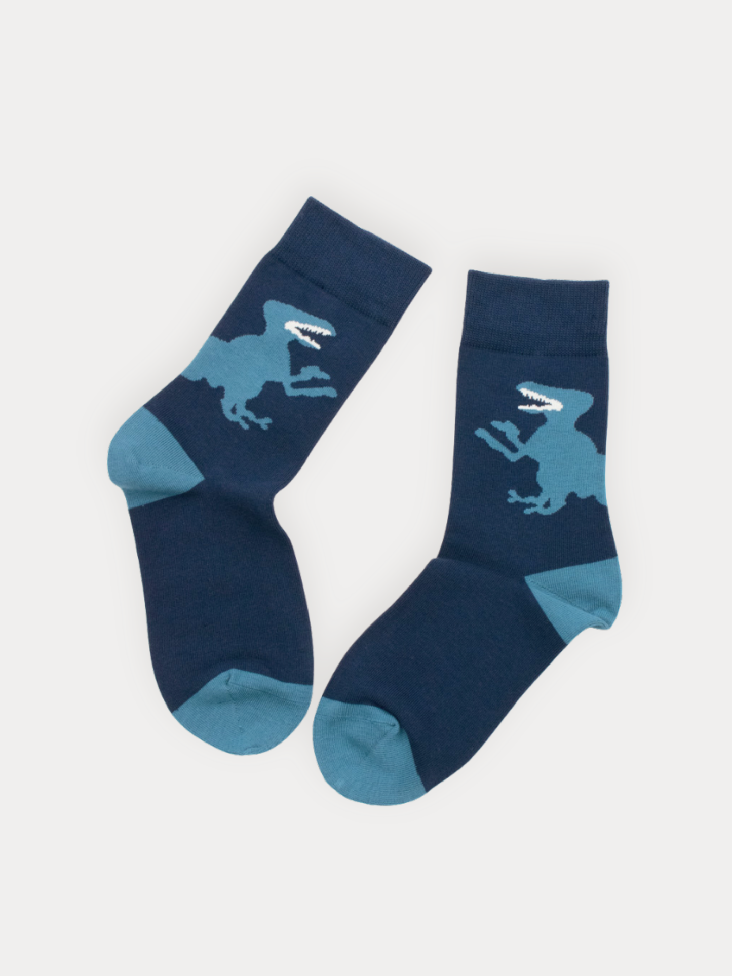 Soft navy crew socks with a bold oversized T-Rex silhouette and steel blue heel and toe.