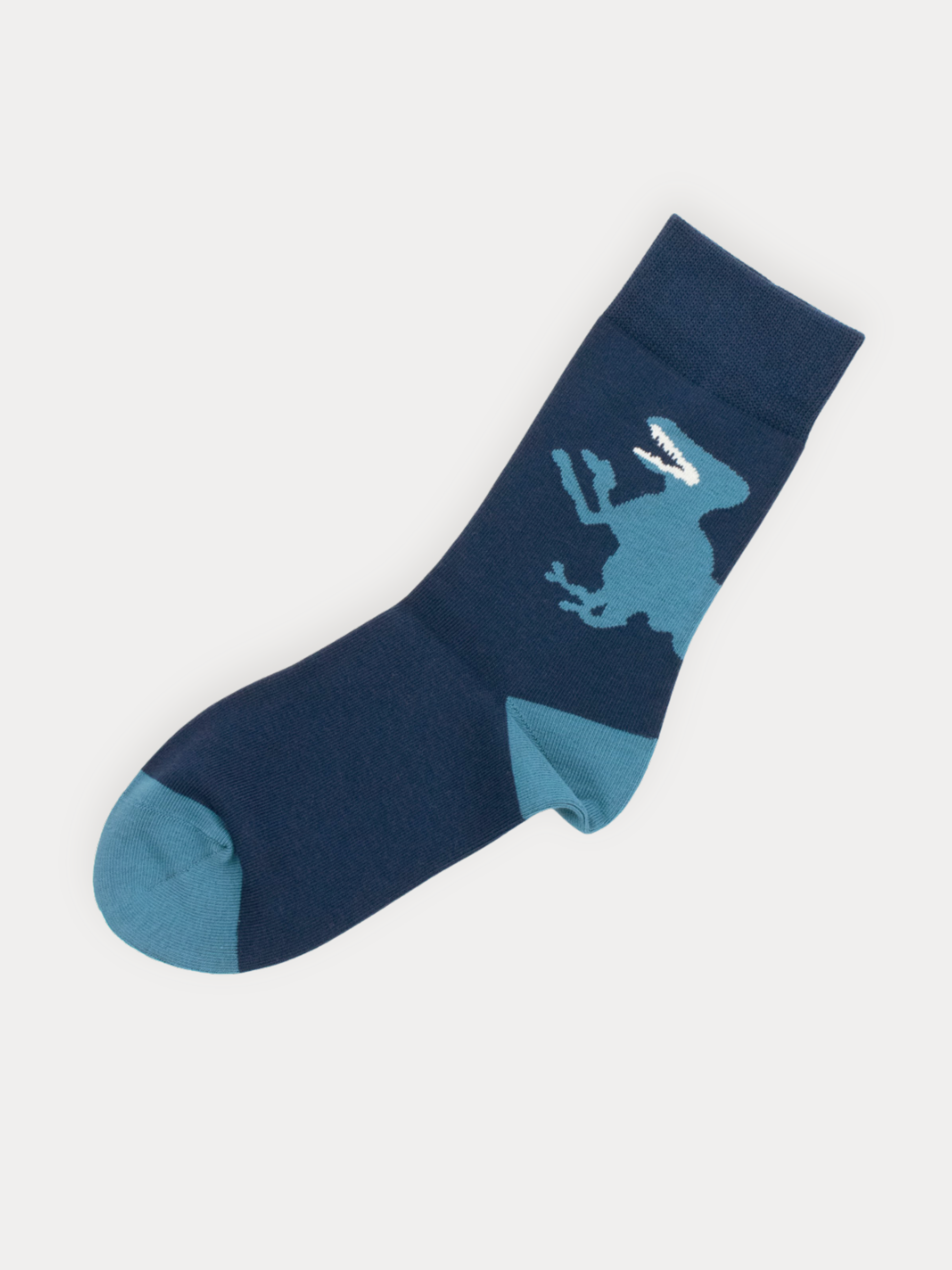 Soft navy crew socks with a bold oversized T-Rex silhouette and steel blue heel and toe.