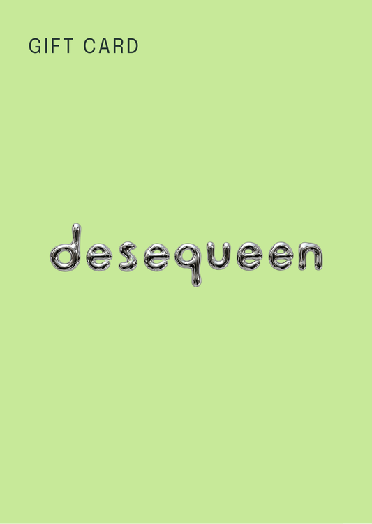 A gift card with a solid light green background, featuring the text 'GIFT CARD' in black at the top left and the word 'desequeen' in a metallic silver bubble font in the center.