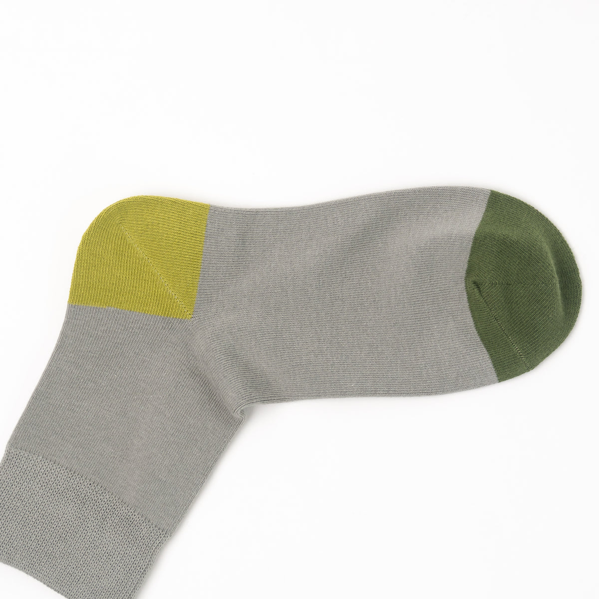 A single gray knit sock with a yellow-green heel section and an olive green toe cap, shown on a plain white background.